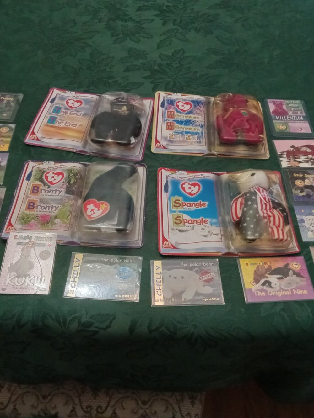 Set of four McDonald's Ty Beanie Babies in packages and collector cards